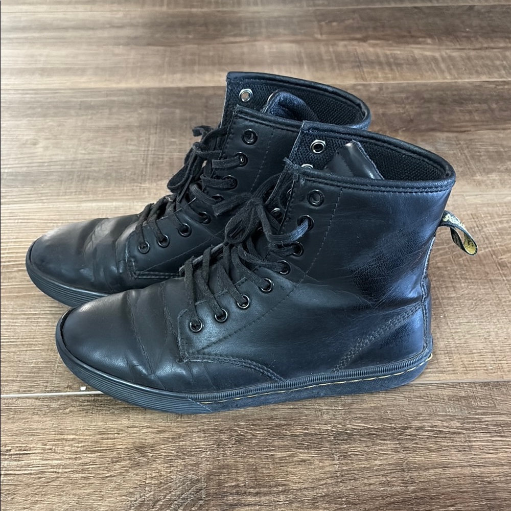 Dr. Martens Black Leather Boots with High-Top Design